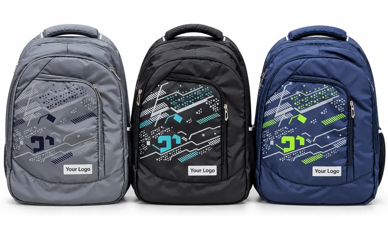 Three backpacks in grey, black and navy with printed graphics on the front